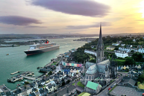 Cobh sunset with the Queen Mary 2 heading out the harbor