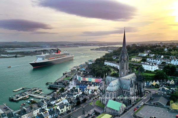 Cobh sunset with the Queen Mary 2 heading out the harbor