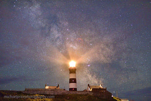The milky way behind the Oldhead lighthouse