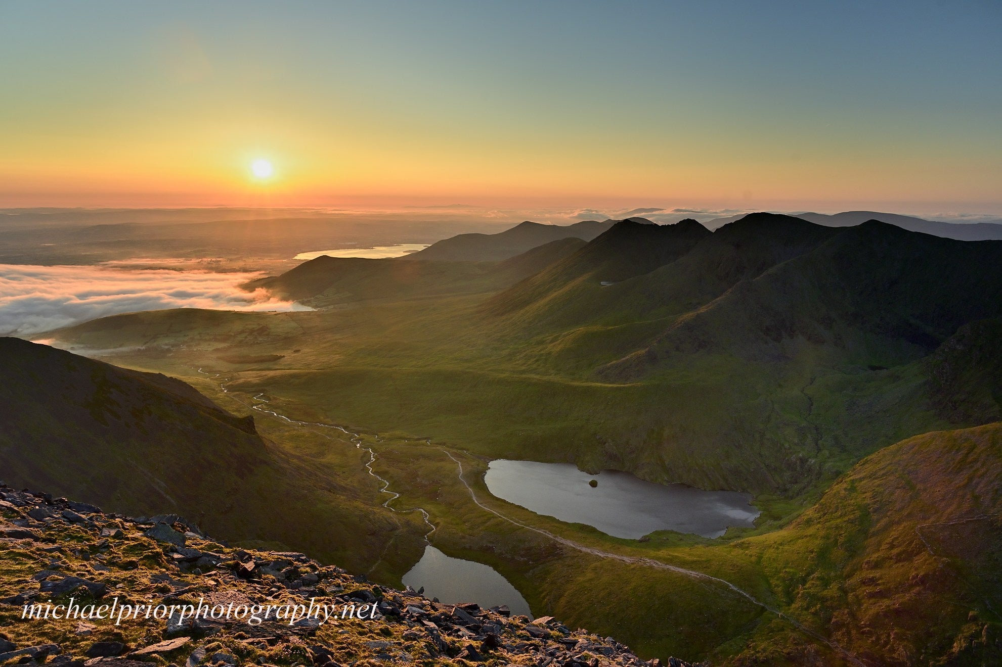 The Macgillycuddyreeks at sunrise from Carrauntoohil