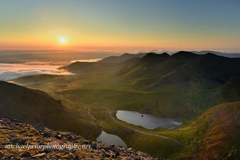 The Macgillycuddyreeks at sunrise from Carrauntoohil