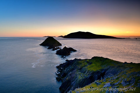 Dunmore head and the Great Blasket Island at sunset.