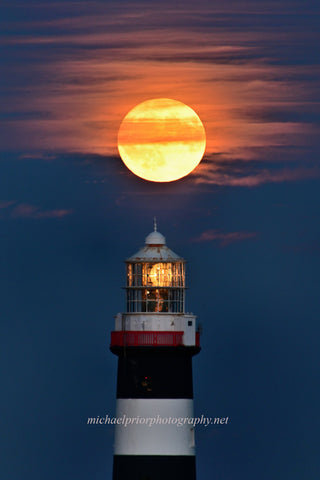 Full moon above the Oldhead lighthouse