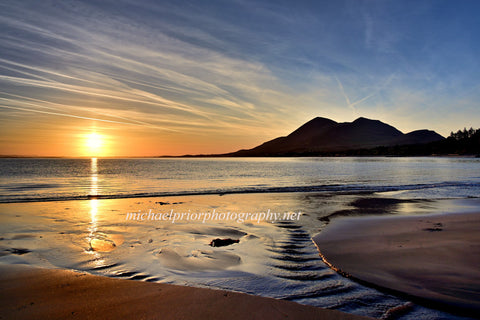 Sunrise from Oldhead beach in Mayo with Croagh Patrick in the distance