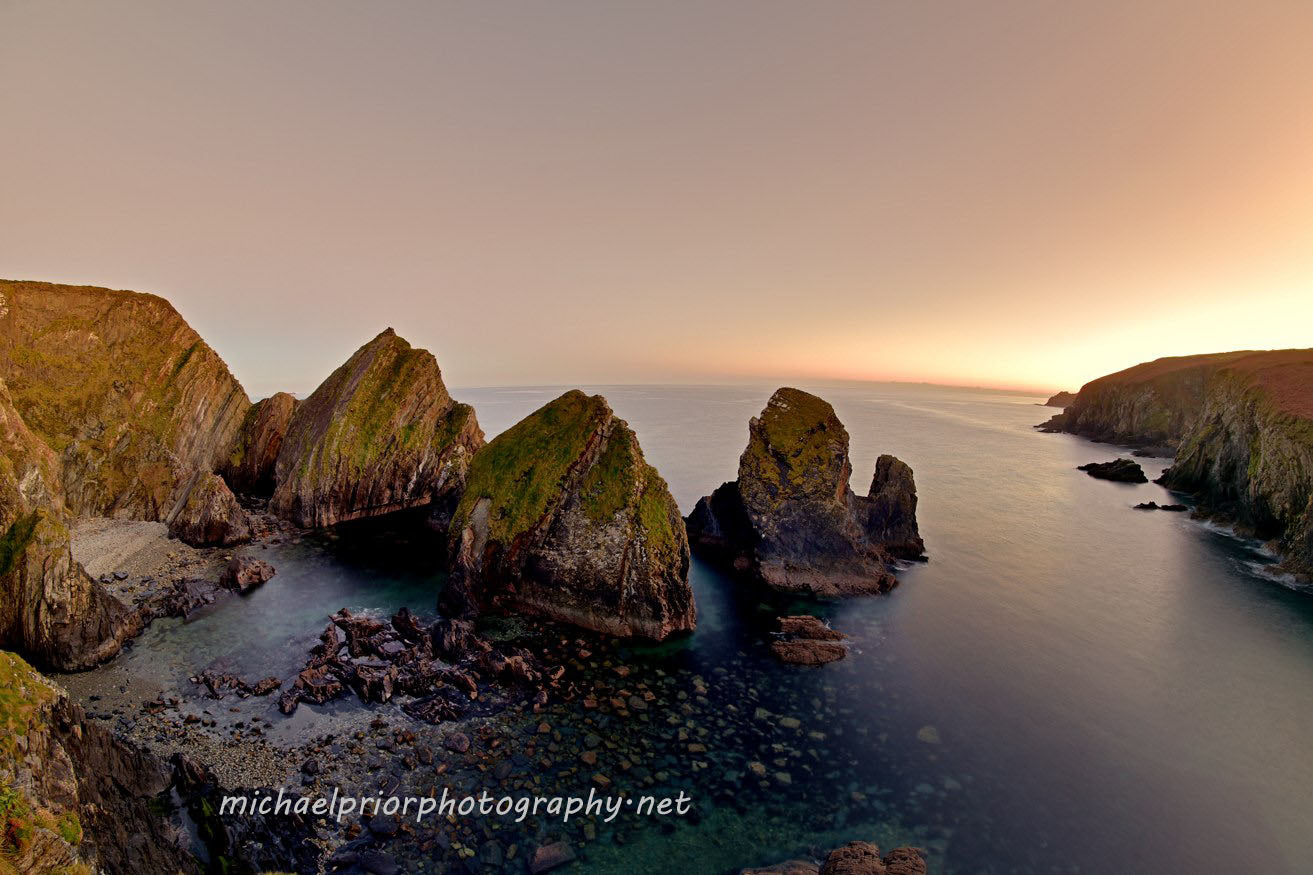 nohoval cove in a misty sunset