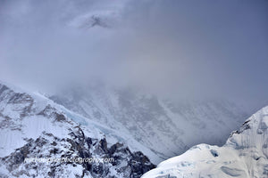 Mt Everest Peeking Through The Clouds
