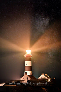 The Oldhead lighthouse at midnight