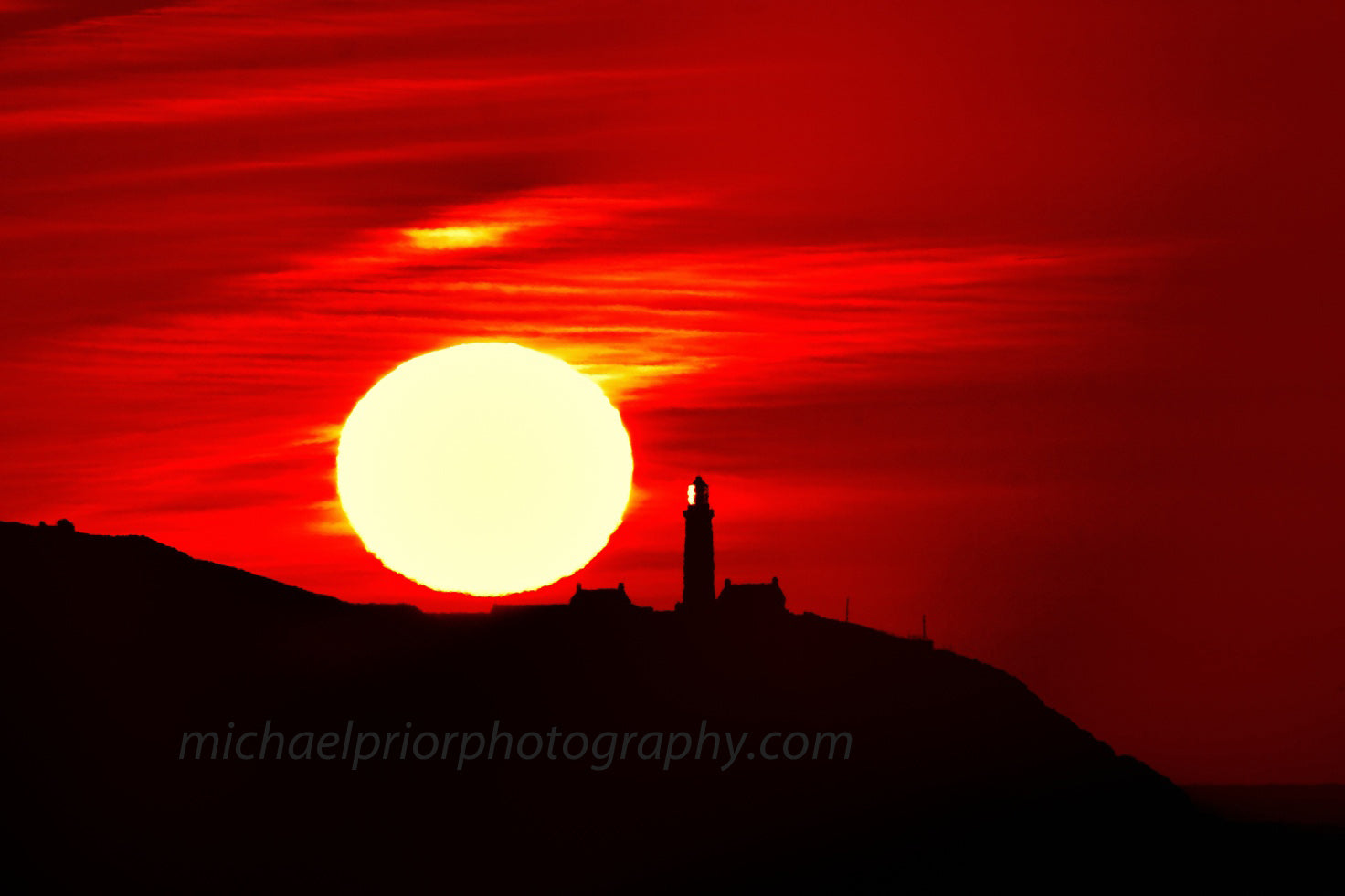 Sunrise Behind The Oldhead ,Silhouette With Red Sky - Michael Prior Photography 